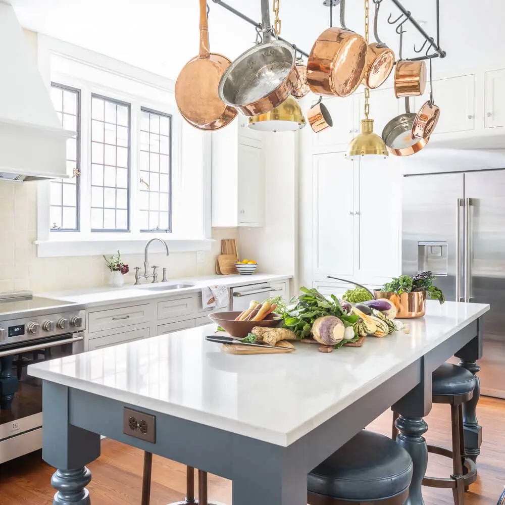 Copper pots hanging in kitchen