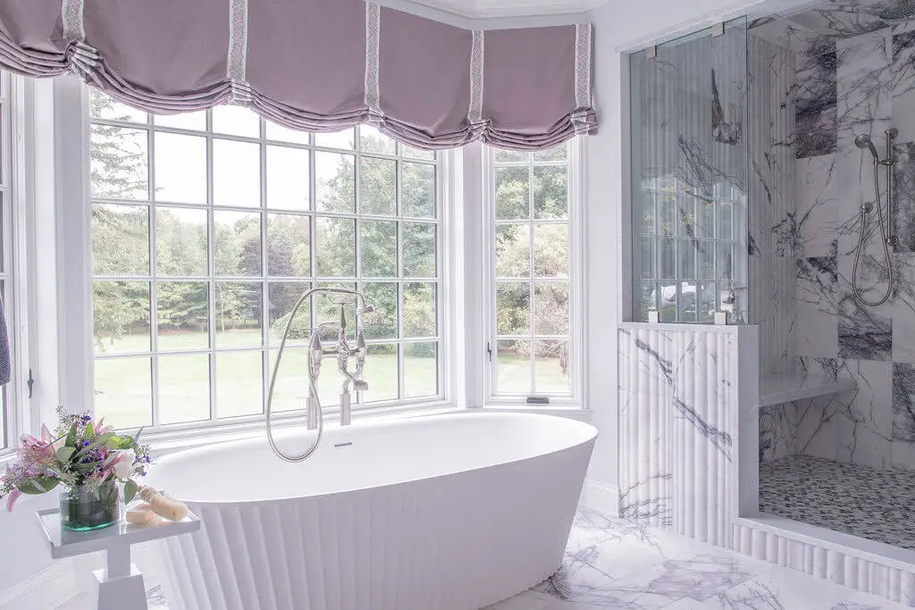 Soaking tub in renovated bathroom.