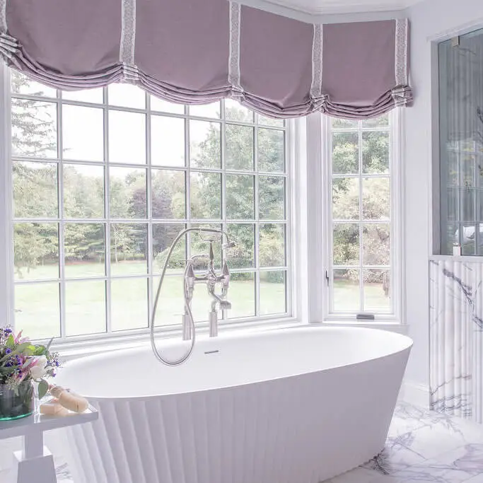 Soaking tub in renovated bathroom.