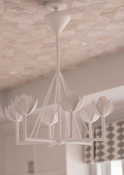 White tulip chandelier in master bedroom