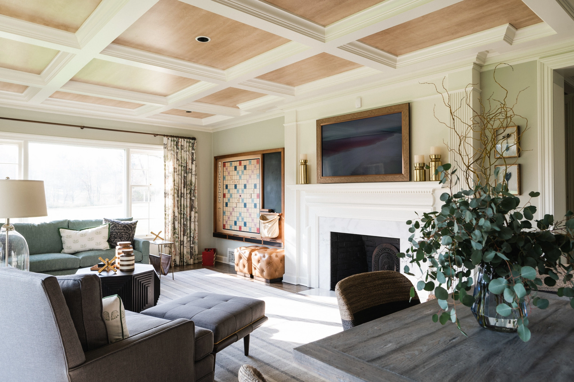 seating area in living room highlighting coffered ceiling detail