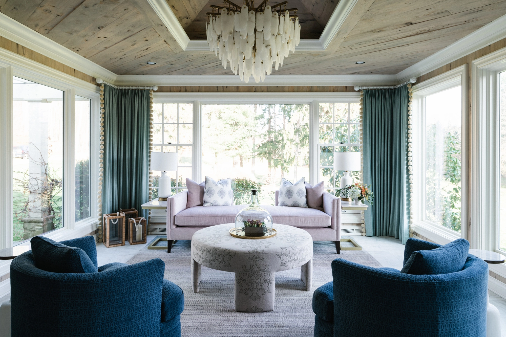 sunroom design with grand chandelier