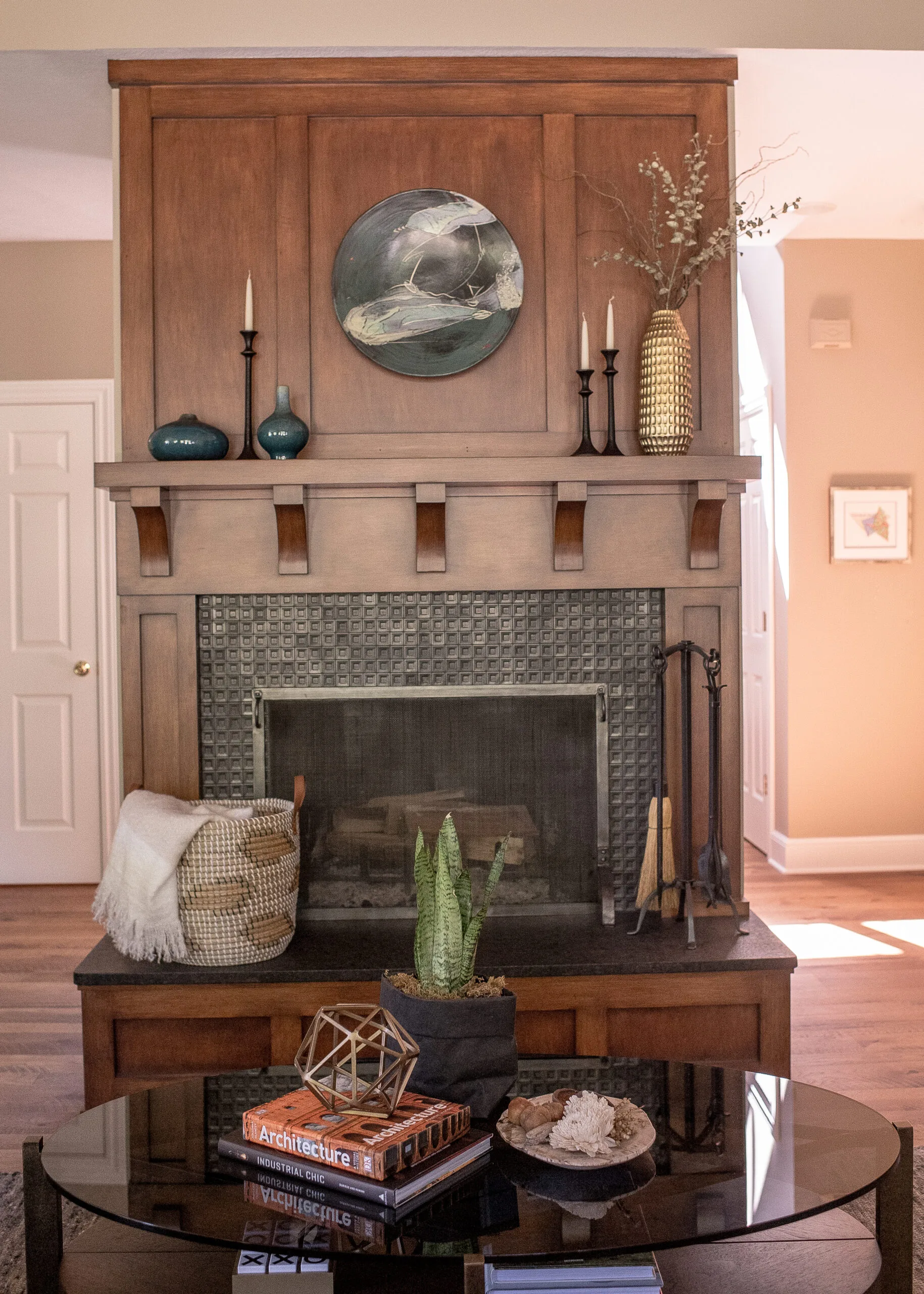 A warm and inviting fireplace decorated nicely