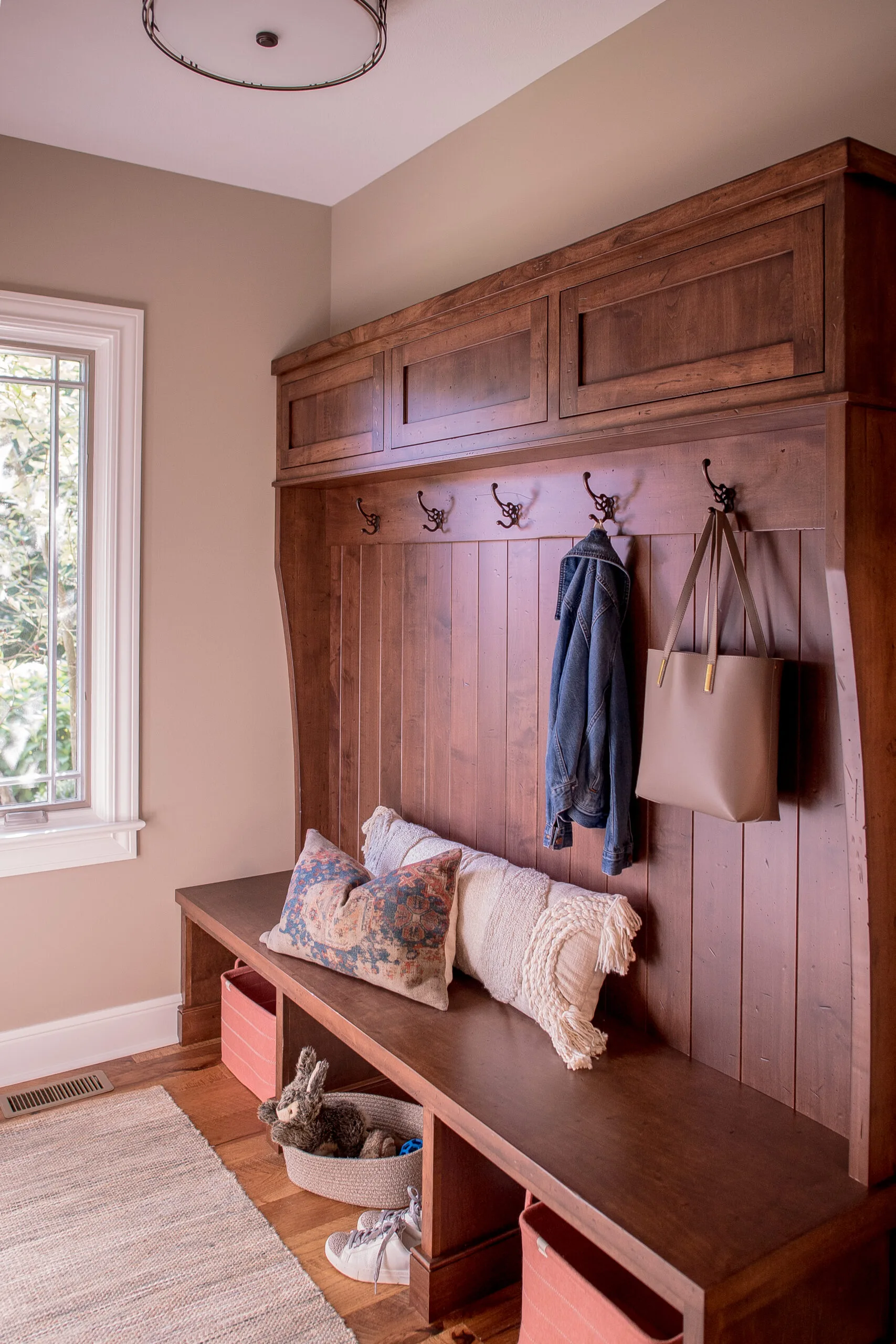 mudroom with hooks and cubbies for shoes