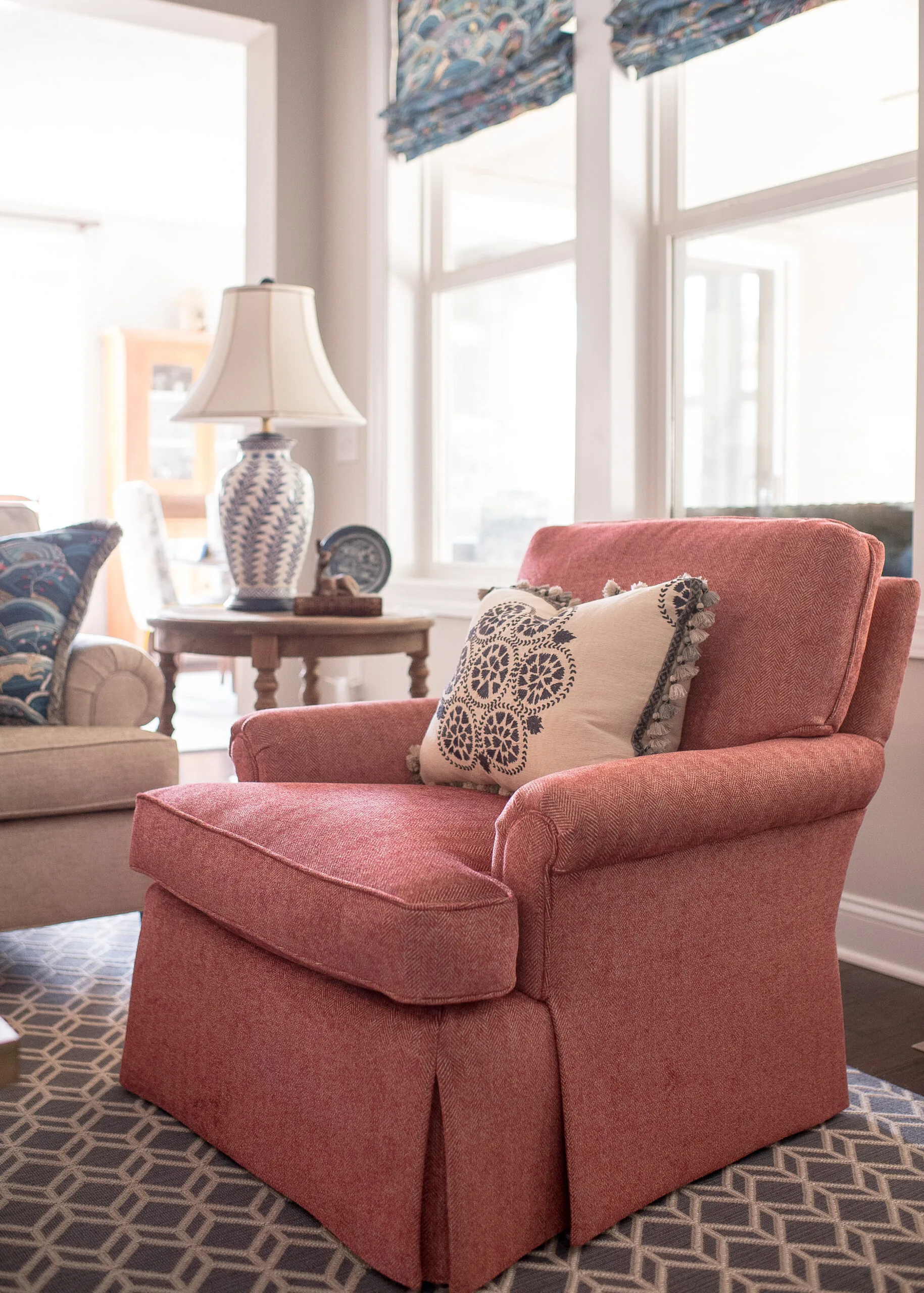 pink upholstered chair in living room