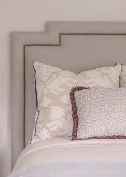 Upholstered headboard and custom pillows