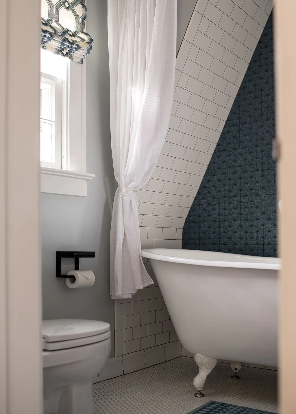 clawfoot bathtub in newly renovated bathroom