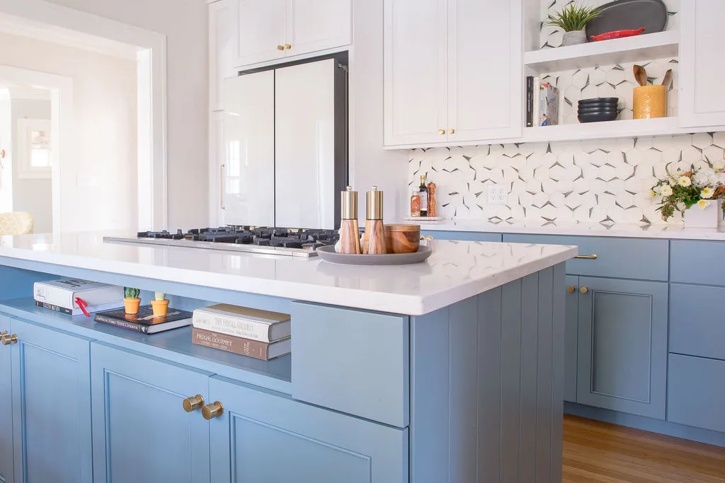 clean and fresh renovated kitchen space with blue and white color palette