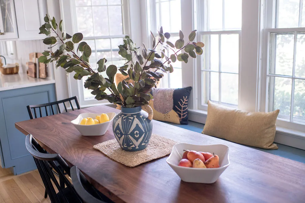 dining room table with floral centerpiece