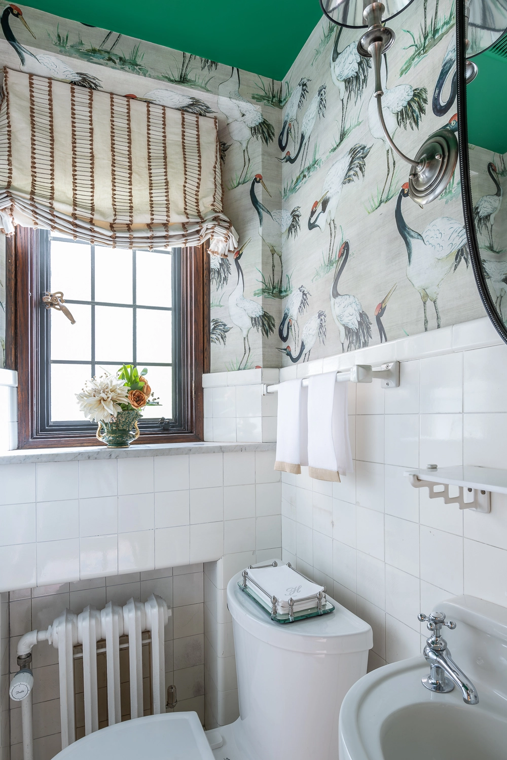 Image looking into a small powder bath with green accents