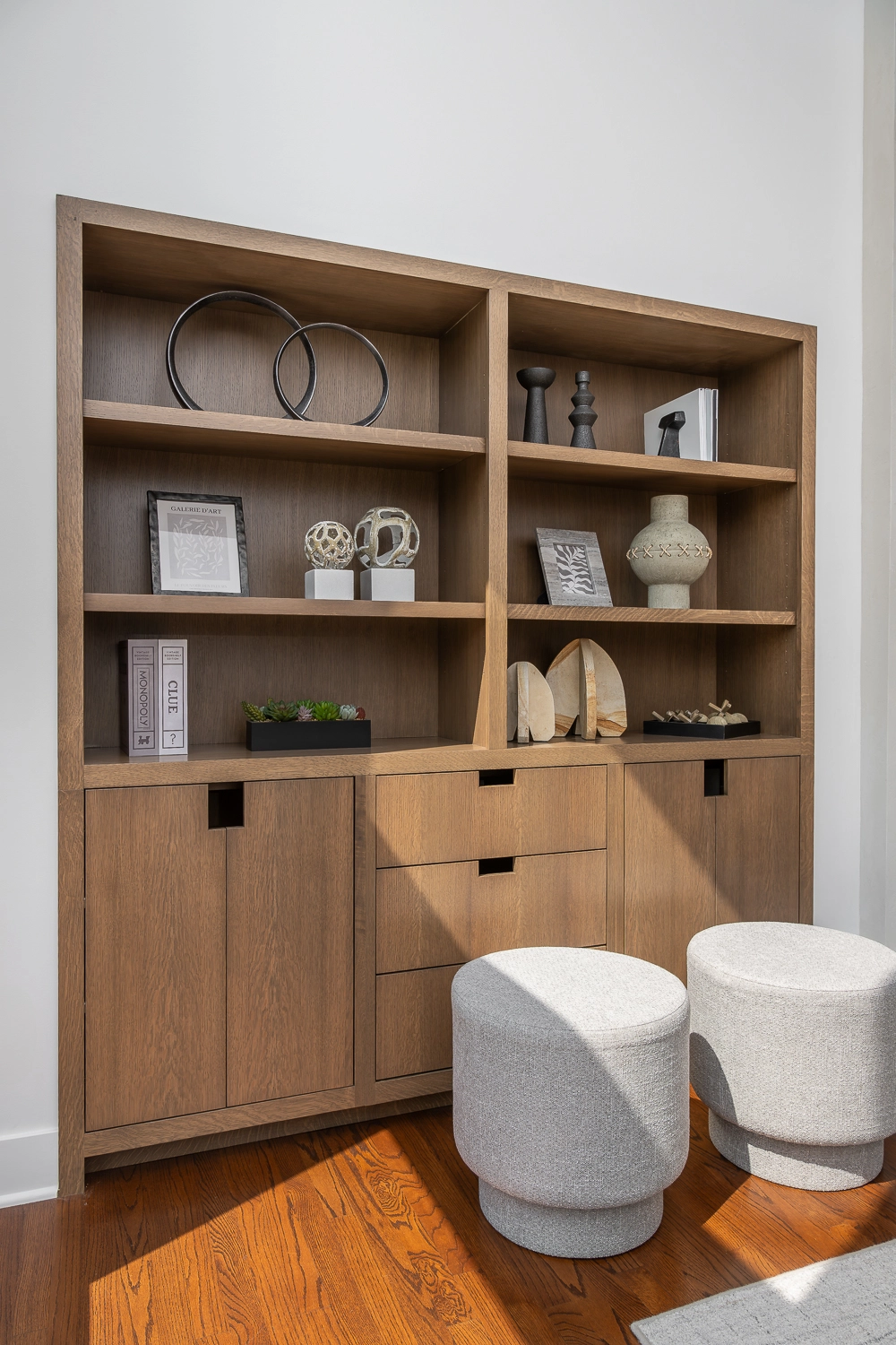 Modern built-in cabinetry luxury white oak with notched finger pulls and luxury accessories