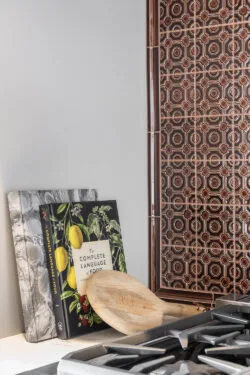 Red patterned kitchen backsplash