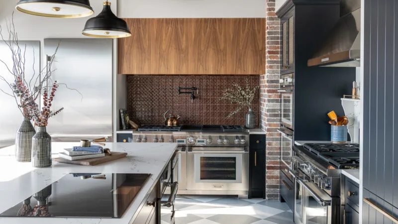 Modern kitchen design with large cooktop island