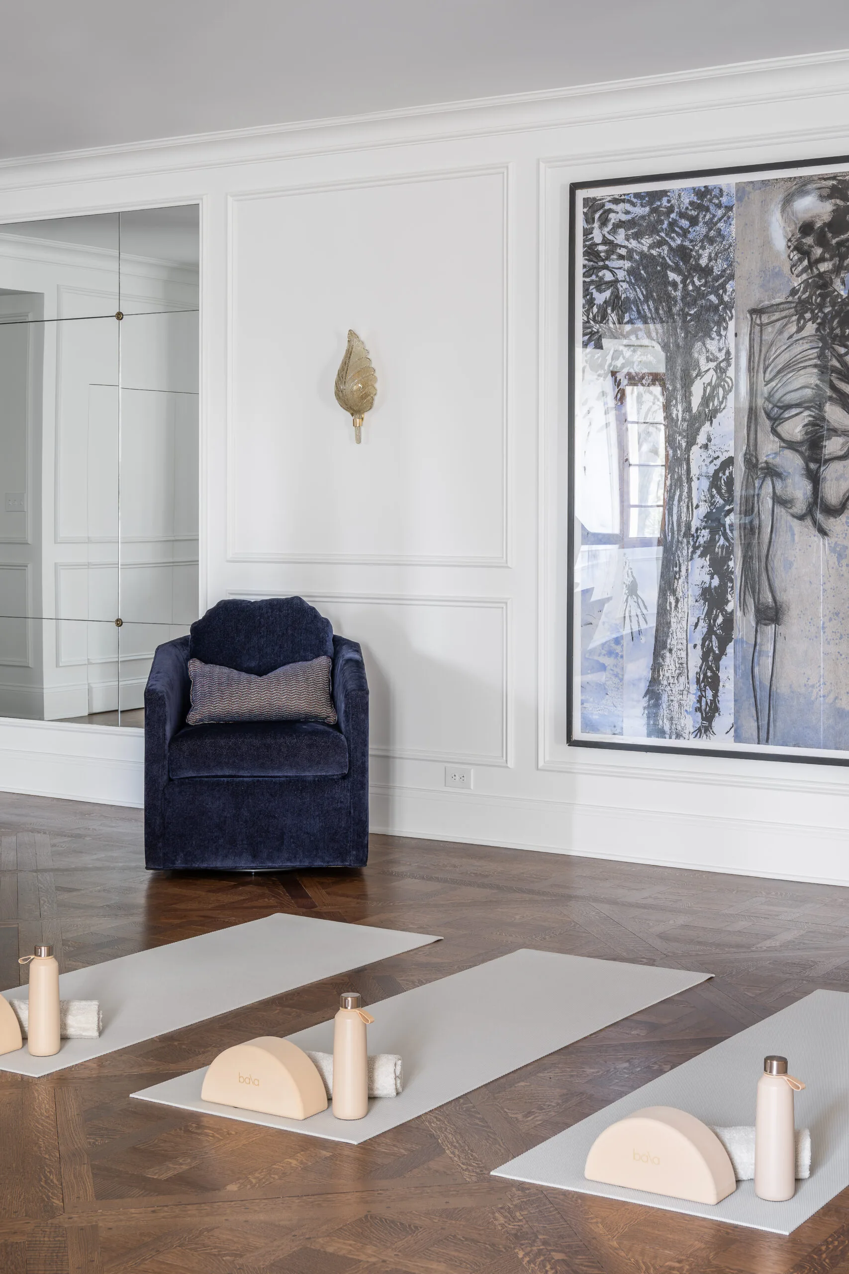 Luxury Home Gym with traditional millwork and large artwork