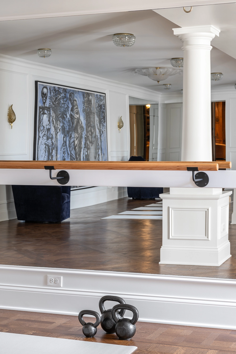 Luxury Home Gym with traditional millwork and lballet bar