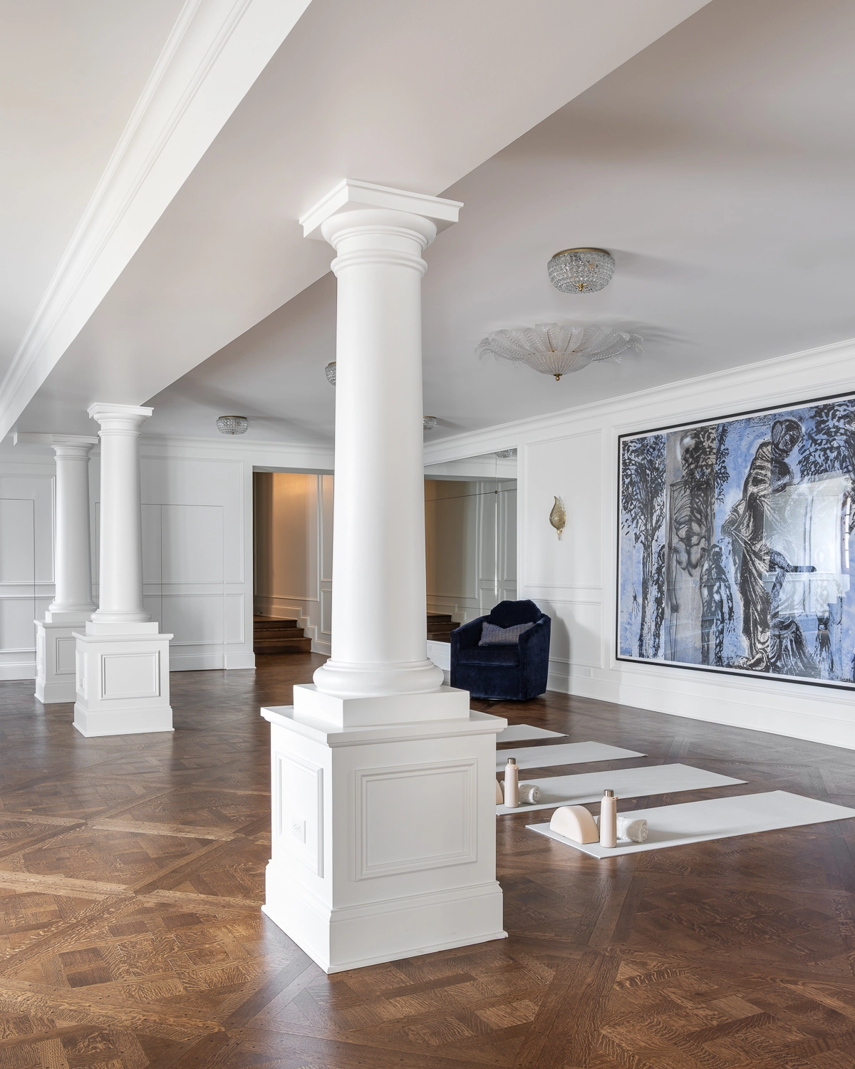 Luxury Home Gym with traditional millwork and modern artwork