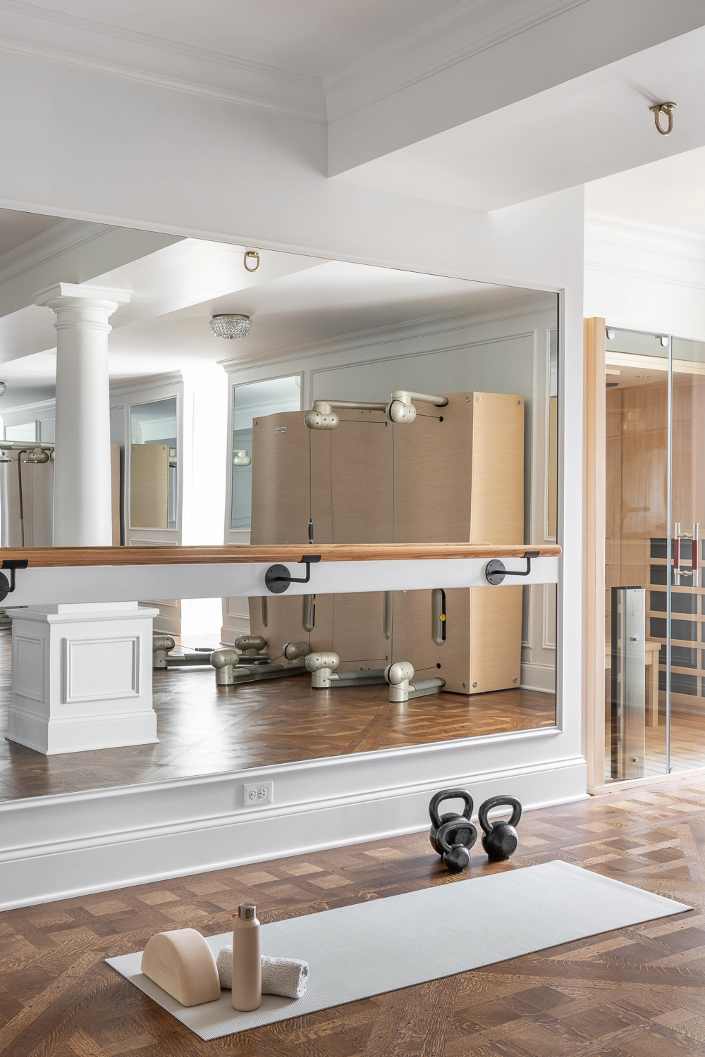 Luxury Home Gym with traditional millwork and ballet bar