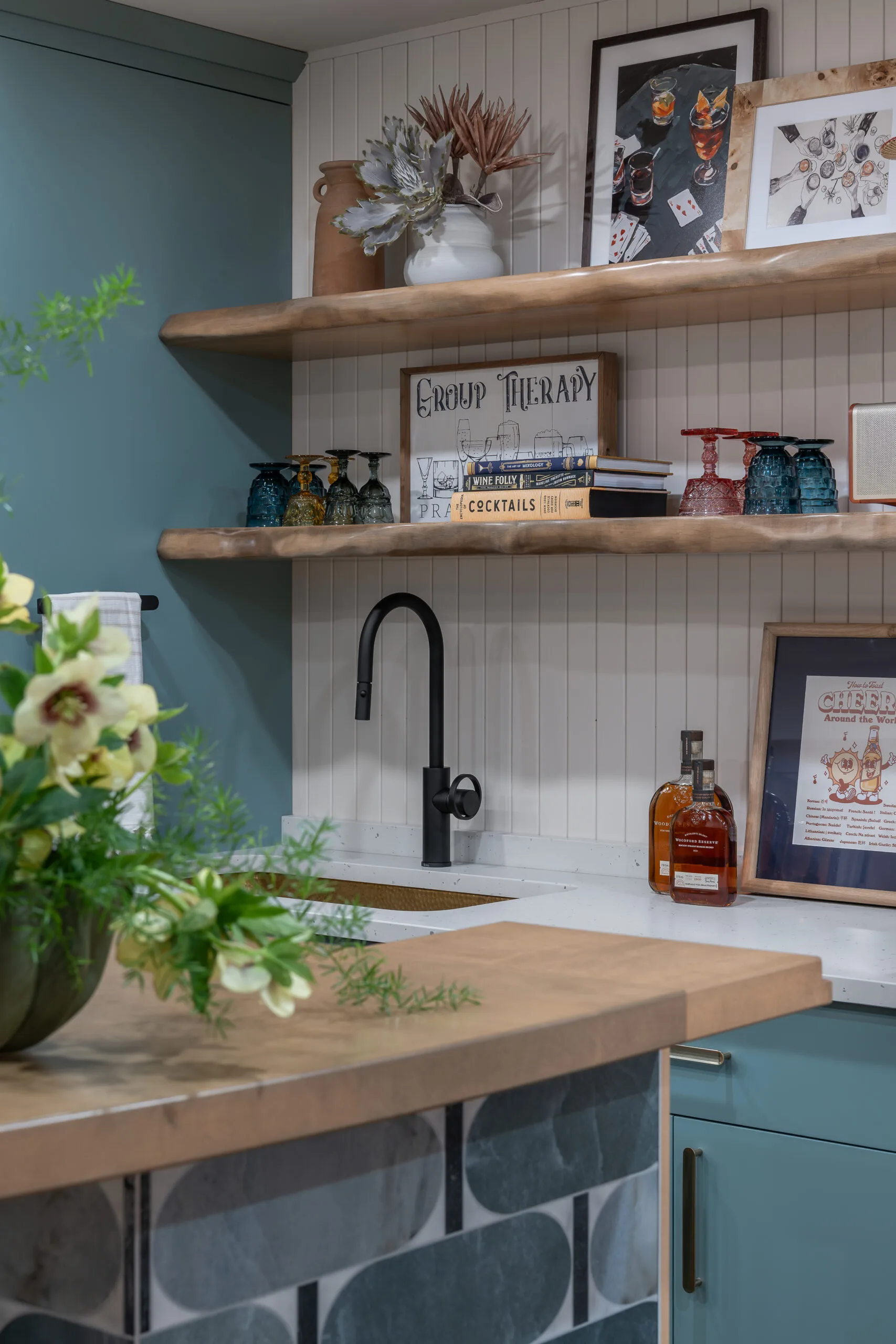 live edge shelving in lower level bar with accessories and vgroove panelling